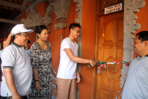 Rad Cutting the Ribbon to the Library